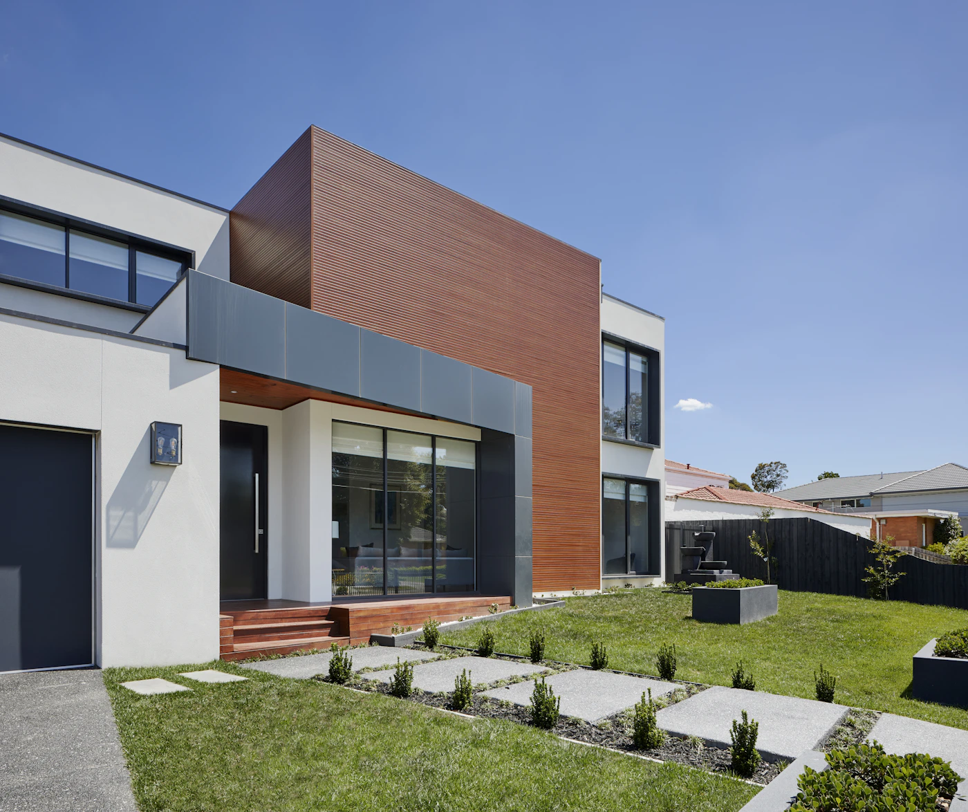 Contemporary family home with a terracotta feature wall