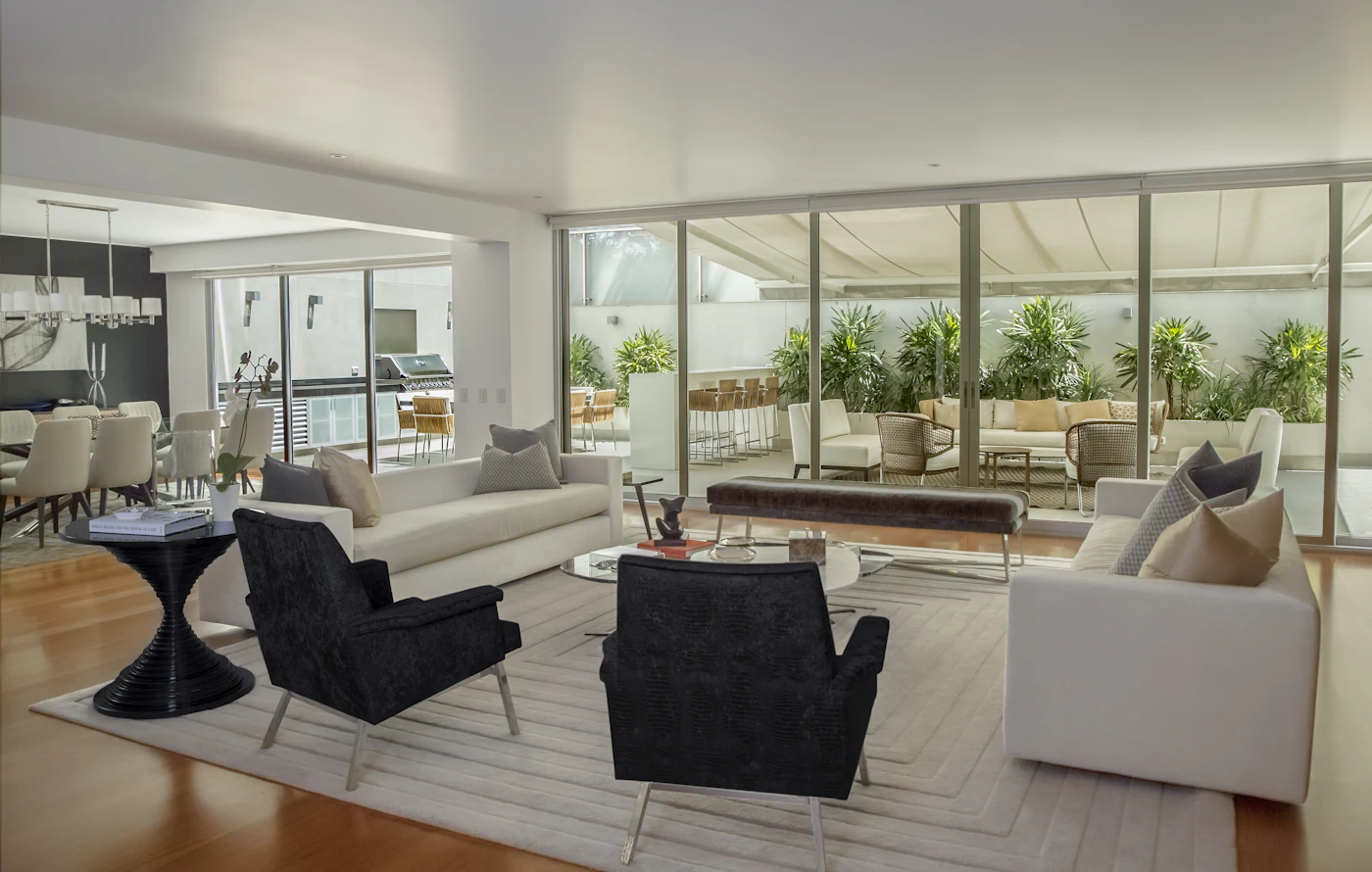 Open-plan living space with large glazing